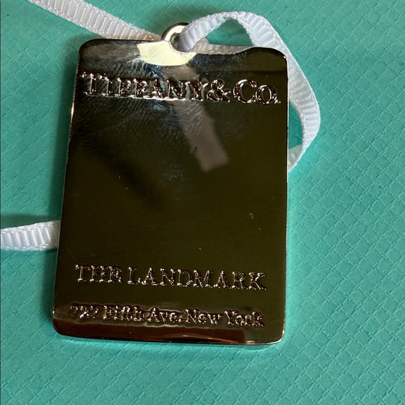 Tiffany’s Silver Toned Bag Charm - Picture 2 of 2